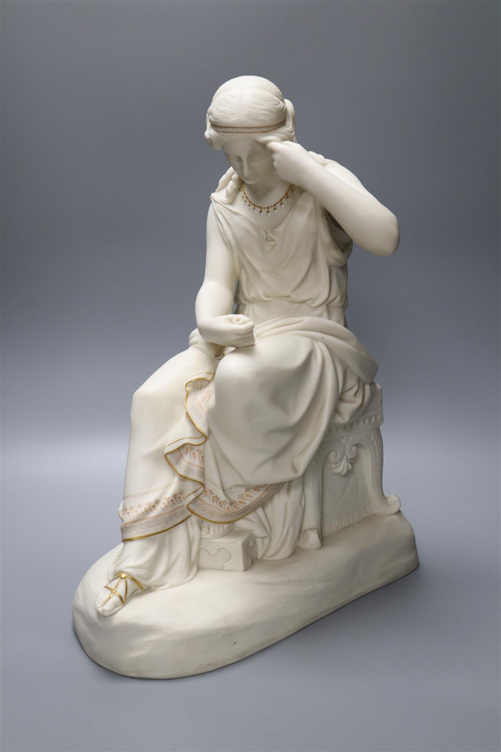 A Victorian Copeland parian figure of a classical beauty at her toilet,